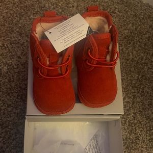 Infant 2/3 Ugg boots. New in box. Never worn.